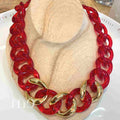 collier maillon rouge transparent et or de Francine Bramli