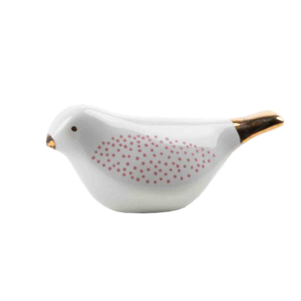 petit oiseau en faience à poser de la marque rader
