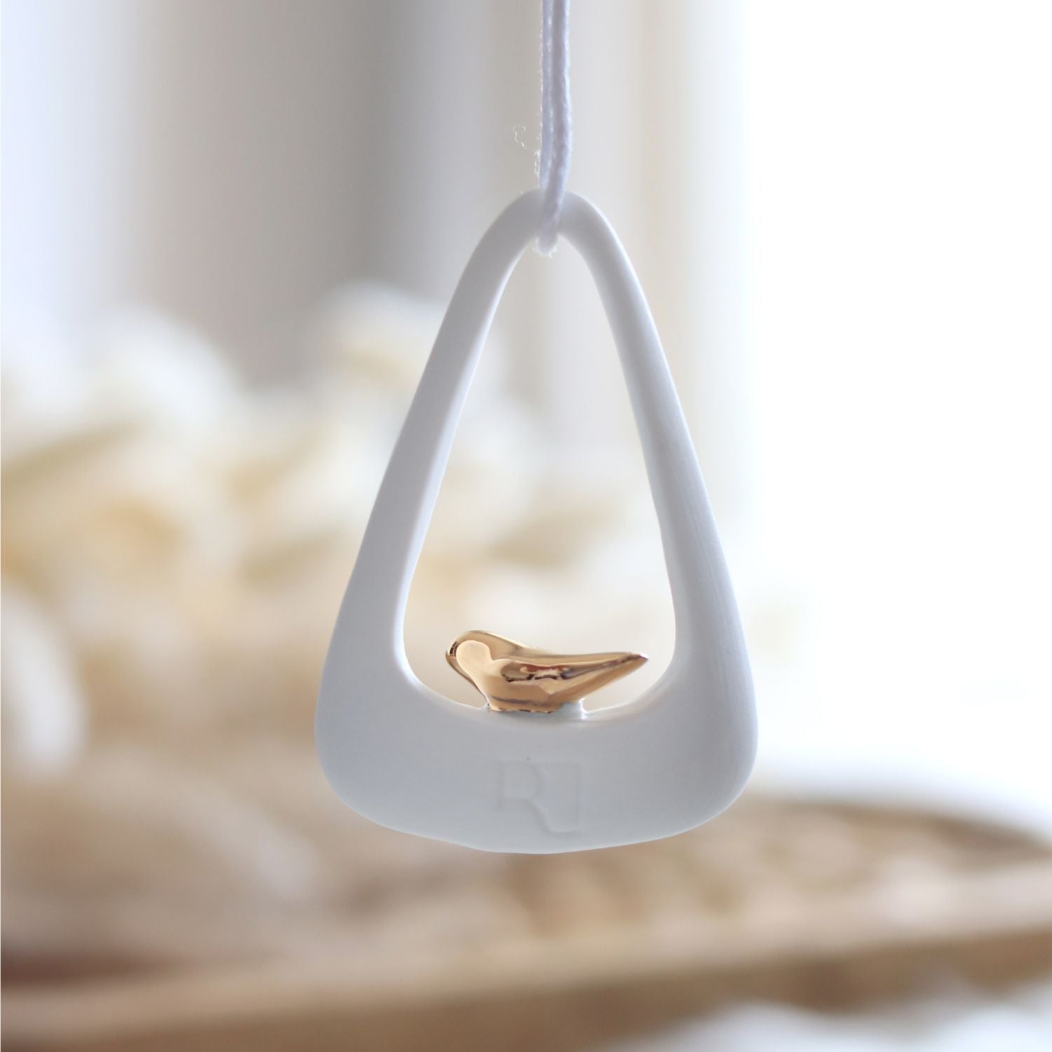 Suspension Épure Oiseau – Räder