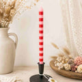 Bougie conique rayée rose et rouge – Ø 1,3 x H20 cm