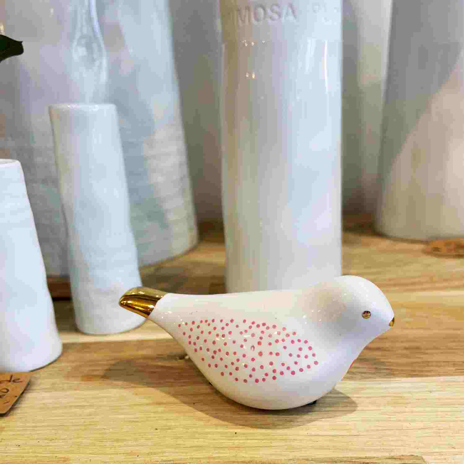 Oiseau en faïence au coeur rose Räder