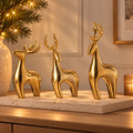 Trio de rennes dorés de Noël